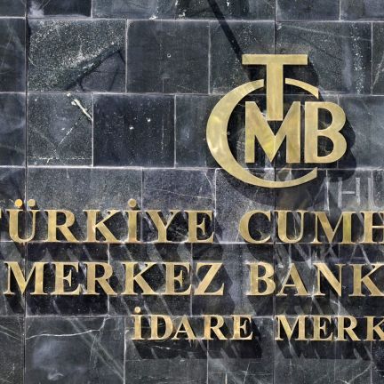 A picture taken on Aug. 14, 2018, shows the logo of Turkey's central bank at the entrance of its headquarters in Ankara. A picture taken on Aug. 14, 2018, shows the logo of Turkey's central bank at the entrance of its headquarters in Ankara.