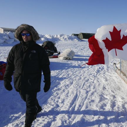 Canada uses polar patrols that combine military assets with local and indigenous volunteers to reassert its Arctic claims. A project manager for the Arctic Research Foundation on April 9, 2015, walks past snowmobiles used by Canadian troops deployed to the territory of Nunavut to demonstrate Canadian sovereignty in the Arctic.