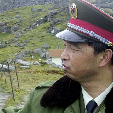 Tensions between India and China have relaxed considerably since their armies faced off on the Doklam Plateau in the summer of 2017. A Chinese soldier interacts with an Indian soldier at the Nathu La Pass area at the India-China border in the northeastern Indian state of Sikkim.