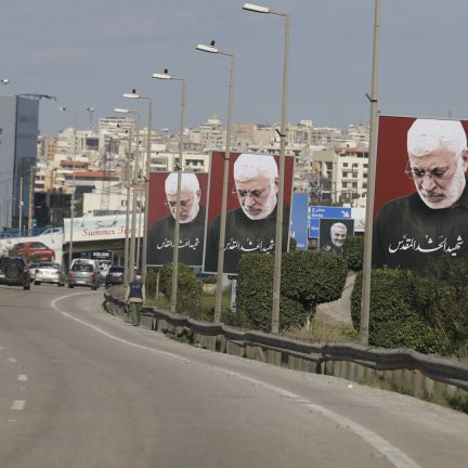 Abu Mahdi al-Muhandis, the late founder of Kataib Hezbollah, commanded respect in Iraq. His death, more than Qassem Soleimani's in the same attack, soured many Iraqis on the U.S. presence in their country. A picture taken on Jan. 11, 2020, shows portraits of Iraq's slain Popular Mobilization Unit deputy chief Abu Mahdi al-Muhandis, the late founder of Kataib Hezbollah, on the southern exit of the Lebanese capital Beirut.