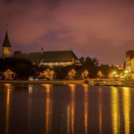 A Russian land sandwiched between European Union members, Kaliningrad is stuck between different worlds. Konigsberg Cathedral and the Pregolya River are seen in this nighttime shot in Kaliningrad.