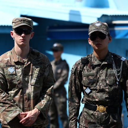 A U.S. soldier (left) stands guard next to a South Korean soldier (right) in Panmunjom, South Korea, on July 27, 2019, during a ceremony commemorating the 66th anniversary of the signing of the Korean War Armistice Agreement. A U.S. soldier (left) stands guard next to a South Korean soldier (right) in Panmunjom, South Korea, on July 27, 2019, during a ceremony commemorating the 66th anniversary of the signing of the Korean War Armistice Agreement.