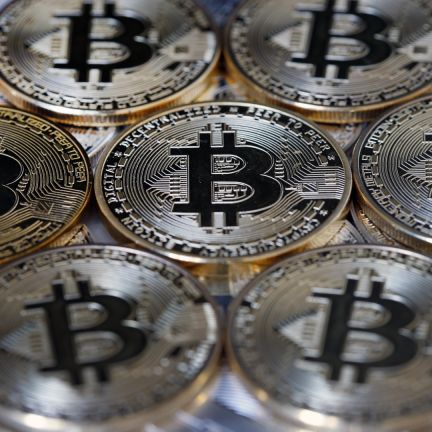 While some governments see cryptocurrencies such as bitcoin, visually represented in this photo illustration, as a threat, others want to harness the advantages they offer. A visual representation of bitcoin on display on April 3, 2019, in Paris.