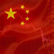 An illustration shows the Chinese flag overlaying stock prices. An illustration shows the Chinese flag overlaying stock prices.