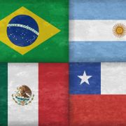 A digital illustration shows the flags of Brazil, Argentina, Colombia, Mexico, Chile and Peru. 