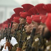 Newly recruited Indian army soldiers from the Jammu and Kashmir Light Infantry (JAKLI) stand in formation during a passing out parade at JAKLI army headquarters in Srinagar on Dec. 7, 2019. 