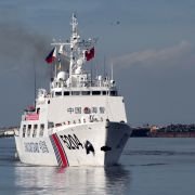 A Chinese coast guard ship prepares to anchor at the Manila port in the Philippines on Jan. 14, 2020. 