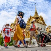 People visit the Grand Palace in Bangkok, Thailand, in June 2020, as it reopened for visitors amid the easing of COVID-19 restrictions. 