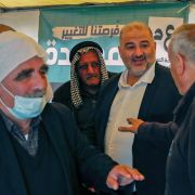 Mansour Abbas, head of Israel's Islamic Ra’am party, speaks with supporters during a rally in the northern Israeli village of Maghar on March 26, 2021. Mansour Abbas, head of Israel's Islamic Ra’am party, speaks with supporters during a rally in the northern Israeli village of Maghar on March 26, 2021.