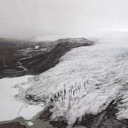 A photo taken during a helicopter tour with U.S. Secretary of State Antony Blinken shows ice receding from a glacier near Kangerlussuaq, Greenland, on May 20, 2021. 