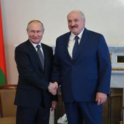 Russian President Vladimir Putin (left) shakes hands with his Belarusian counterpart Alexander Lukashenko in Saint Petersburg, Russia, on July 13, 2021. 