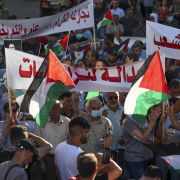 Palestinian protesters rally in Ramallah city on July 17, 2021, denouncing the Palestinian Authority after activist Nizar Banat died while in the custody of its security forces. Palestinian protesters rally in Ramallah city on July 17, 2021, denouncing the Palestinian Authority after activist Nizar Banat died while in the custody of its security forces.