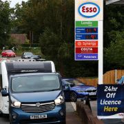 Cars line up at a gas station in the U.K. village of Odiham amid fuel shortages on Sept. 30, 2021. Cars line up at a gas station in the U.K. village of Odiham amid fuel shortages on Sept. 30, 2021.