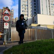 A security guard patrols outside a building that houses the NATO information office in Moscow on Oct. 18, 2021, after Russia announced it was ending the country’s mission to the Western military alliance. A security guard patrols outside a building that houses the NATO information office in Moscow on Oct. 18, 2021, after Russia announced it was ending the country’s mission to the Western military alliance.