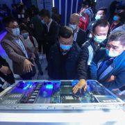 Visitors look at Alibaba's new servers at the company's annual cloud computing conference in Hangzhou, China, on Oct. 19, 2021. Visitors look at Alibaba's new servers at the company's annual cloud computing conference in Hangzhou, China, on Oct. 19, 2021.