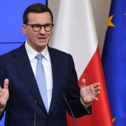 Polish Prime Minister Mateusz Morawiecki speaks during a press conference on Oct. 22, 2021, after meeting with EU leaders in Brussels. 
