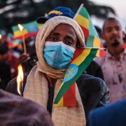 A woman holds a candle during a memorial service for the victims of the Tigray conflict in Addis Ababa, Ethiopia, on Nov. 3, 2021. A woman holds a candle during a memorial service for the victims of the Tigray conflict in Addis Ababa, Ethiopia, on Nov. 3, 2021.