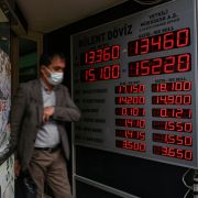 A customer leaves a currency exchange agency in Istanbul, Turkey, on Dec. 2, 2021.