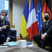 French President Emmanuel Macron (left) meets with Ukrainian President Volodymyr Zelensky during an Eastern Partnership summit at the European Council headquarters in Brussels, Belgium, on Dec. 15, 2021. 