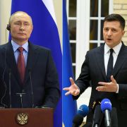A combination of photos created on Jan. 11, 2022, shows Russian President Vladimir Putin (left) and Ukrainian President Volodymyr Zelensky (right) at separate press conferences. A combination of photos created on Jan. 11, 2022, shows Russian President Vladimir Putin (left) and Ukrainian President Volodymyr Zelensky (right) at separate press conferences.