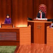 The president of Hong Kong’s Legislative Council, Andrew Leung (center), looks on as Chief Executive Carrie Lam (left) makes an address during the first session of the newly elected legislature on Jan. 12, 2022. The president of Hong Kong’s Legislative Council, Andrew Leung (center), looks on as Chief Executive Carrie Lam (left) makes an address during the first session of the newly elected legislature on Jan. 12, 2022.