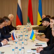 Members of delegations from Ukraine and Russia hold talks in Belarus following the Russian invasion of Ukraine on Feb. 28, 2022.