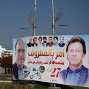 A banner featuring an image of Pakistani Prime Minister Imran Khan (right) is seen outside the parliament building in Islamabad on March 31, 2022. A banner featuring an image of Pakistani Prime Minister Imran Khan (right) is seen outside the parliament building in Islamabad on March 31, 2022.