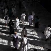 Muslim pilgrims walk at the Grand Mosque in Saudi Arabia's holy city of Mecca on July 6, 2022 during the annual hajj pilgrimage. 