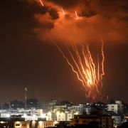 A picture taken on Aug. 5, 2022, shows Palestinian rockets being fired from Gaza City in response to earlier Israeli airstrikes.