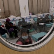 COVID-19 patients are seen on beds at a hospital in Tianjin, China, on Dec. 28, 2022.