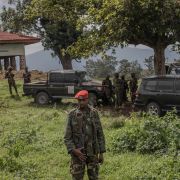M23 fighters guard the area during a meeting between the rebel group and East African Regional Force (EACRF) officials at the Rumangabo camp in eastern Democratic Republic of Congo on Jan. 6, 2023.