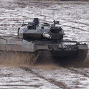 A Leopard 2 A6 heavy battle tank participates in a demonstration of capabilities during a visit by German Defence Minister Christine Lambrecht to the Bundeswehr Army training grounds on Feb. 7, 2022, in Munster, Germany. 