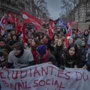 People march in the streets of Paris, France, to protest against President Emmanuel Macron's pension reform plans as part of a nationwide strike on Jan. 19, 2023. People march in the streets of Paris, France, to protest against President Emmanuel Macron's pension reform plans as part of a nationwide strike on Jan. 19, 2023.