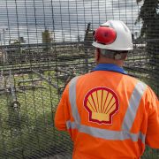 A Shell employee looks at the Agbada 2 oil flow station in Port Harcourt, Nigeria, in September 2015. 
