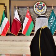 A man walks past the flags of the countries attending the Gulf Cooperation Council (GCC) summit in Kuwait City, Kuwait, on Dec. 5, 2017. A man walks past the flags of the countries attending the Gulf Cooperation Council (GCC) summit in Kuwait City, Kuwait, on Dec. 5, 2017.