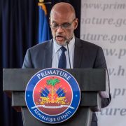 Ariel Henry speaks as he becomes prime minister of Haiti on July 20, 2021, in the capital of Port-au-Prince. Rival claims to Haiti's government would undermine the legitimacy of the electoral process, the economy and the country's security situation. Ariel Henry speaks as he becomes prime minister of Haiti on July 20, 2021, in the capital of Port-au-Prince.