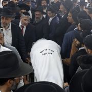 Mourners attend the funeral of Yaakov Shalom, one of the five people killed in yesterday's shooting attack in the religious town of Bnei Brak, at the Yarkon cemetery in the Israeli city of Petah Tikva on March 30, 2022.