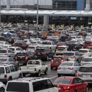 Cars line up on the Mexican side of the San Ysidro crossing port at the U.S.-Mexico border in Tijuana, Mexico, on March 12, 2020.Cars line up on the Mexican side of the San Ysidro crossing port at the U.S.-Mexico border in Tijuana, Mexico, on March 12, 2020. Cars line up on the Mexican side of the San Ysidro crossing port at the U.S.-Mexico border in Tijuana, Mexico, on March 12, 2020.