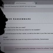 An IT researcher stands next to a giant screen of a computer infected by ransomware at High Security Laboratory of the National Institute for Research in Computer Science and Automation in Rennes, France, on Nov. 3, 2016. The evolution of hostage-taking and associated ransom demands suggests ransomware may grow to encompass more perpetrators, targets and demands. An IT researcher stands next to a giant screen of a computer infected by ransomware at High Security Laboratory of the National Institute for Research in Computer Science and Automation in Rennes, France, on Nov. 3, 2016.