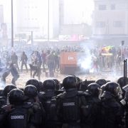 Protesters fight gendarmes on March 5, 2021, near their barracks in the Colobane neighborhood in Dakar, Senegal, during clashes following the arrest of the main opposition leader, Ousmane Sonko. Sonko will face a court hearing on March 8 related to rape charges against him that Sonko and his supporters claim are entirely political. Protesters fight gendarmes on March 5, 2021, near their barracks in the Colobane neighborhood in Dakar, Senegal, during clashes following the arrest of the main opposition leader, Ousmane Sonko.