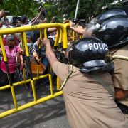 Opposition activists outside Sri Lankan Prime Minister Ranil Wickremesinghe's private residence on June 22, 2022, in Colombo, Sri Lanka. Opposition activists outside Sri Lankan Prime Minister Ranil Wickremesinghe's private residence on June 22, 2022, in Colombo, Sri Lanka.