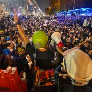 A protester uses a loudspeaker to talk to the crowd during an anti-government rally in Bangkok, Thailand, on Oct. 19, 2020. A protester uses a loudspeaker to talk to the crowd during an anti-government rally in Bangkok, Thailand, on Oct. 19, 2020.