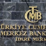 A picture taken on Aug. 14, 2018, shows the logo of Turkey's central bank at the entrance of its headquarters in Ankara. A picture taken on Aug. 14, 2018, shows the logo of Turkey's central bank at the entrance of its headquarters in Ankara.