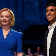 The two candidates running in the U.K. prime minister race, Foreign Secretary Liz Truss (left) and former Chancellor Rishi Sunak, arrive to take part in a BBC televised debate in Stoke-on-Trent, England, on July 25, 2022. 