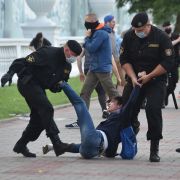 Plainclothed Belarus' security forces and riot police officers detain a protester at an opposition demonstration in Minsk, Belarus, on July 14, 2020. Plainclothed Belarus' security forces and riot police officers detain a protester at an opposition demonstration in Minsk, Belarus, on July 14, 2020.