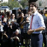 Canadian Prime Minister Justin Trudeau addresses the media in Winnipeg, Manitoba, on Sept. 19, 2019, regarding photos and video that have surfaced in which he is wearing dark makeup.