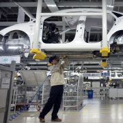 A worker assembles a vehicle in a Hyundai plant in China's Hebei province. South Korean automakers have increased their manufacturing capacity in China to  A significant proportion of South Korea's auto manufacturing capacity in China to 2.1 million vehicles annually.