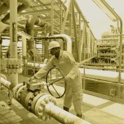 A worker inspects a Total oil drilling platform near Port Harcourt in the Niger Delta. 