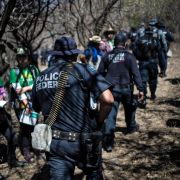 Mexican Federal Police officers participate in the fourth National Search Brigade for people who have gone missing in the drug war in Huitzuco de los Figueroa, Guerrero, on Jan. 21, 2019.