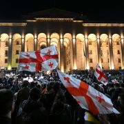 Georgian opposition supporters gather outside the parliament in Tbilisi on March 9, 2023, ahead of a vote on the ruling party's controversial ''foreign agent'' bill. 